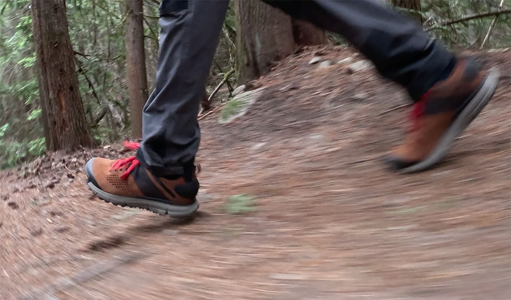 A fast tracking shot of the Danner Trail 2650 shoes while running