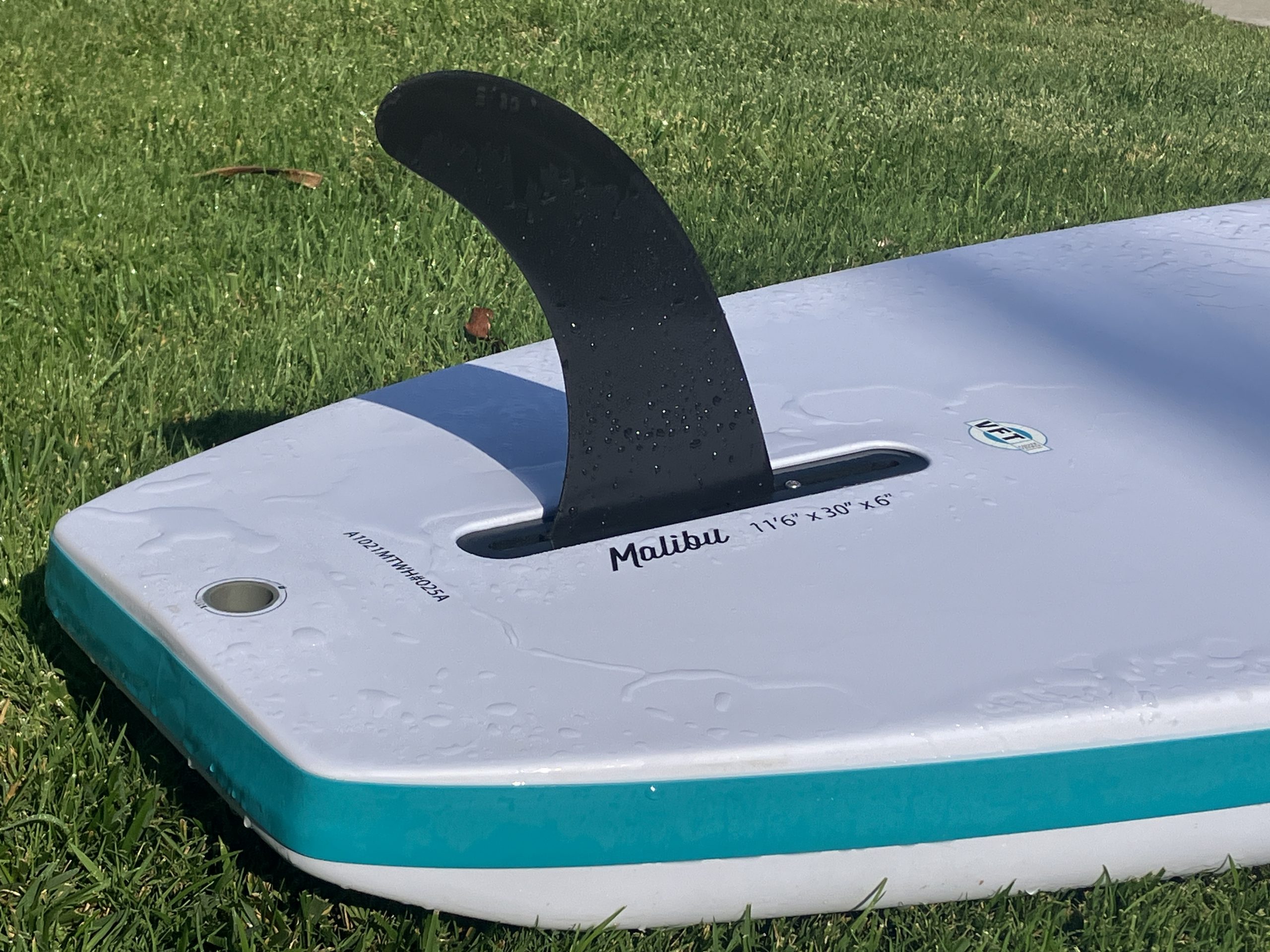 a fin on a paddle board