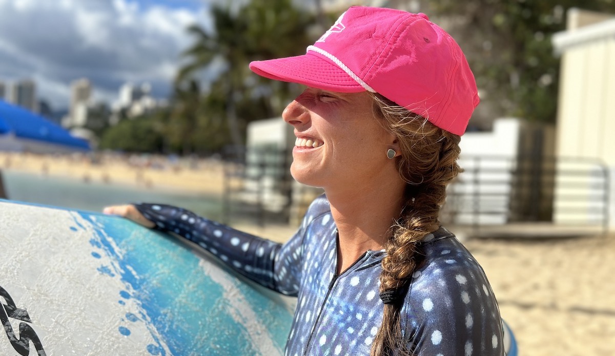 a woman wearing a surf hats