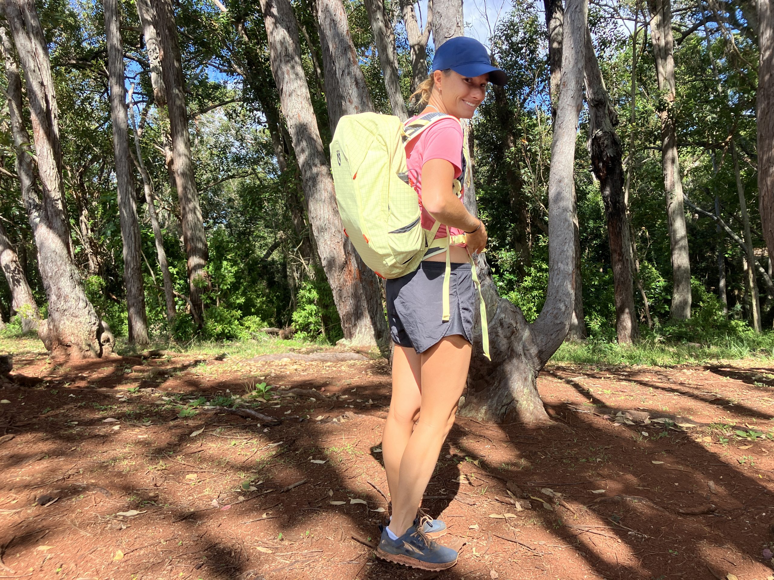 a woman wearing a hiking backpack