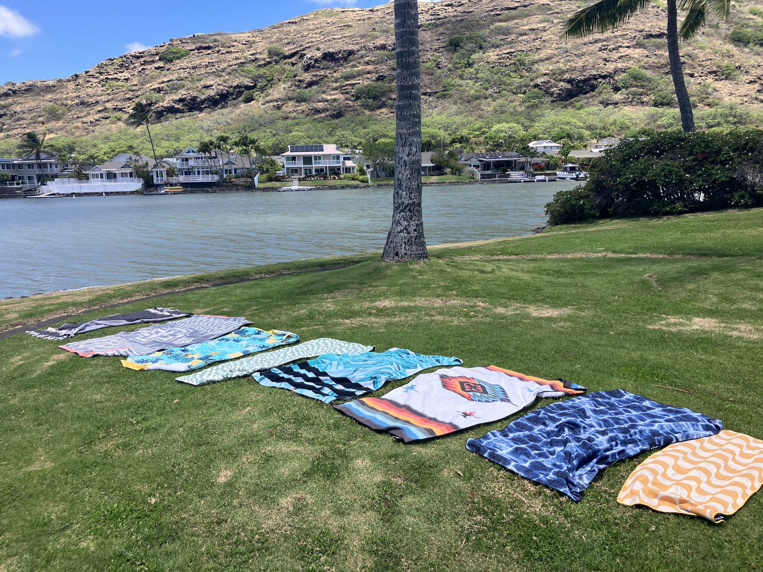 a bunch of beach towels