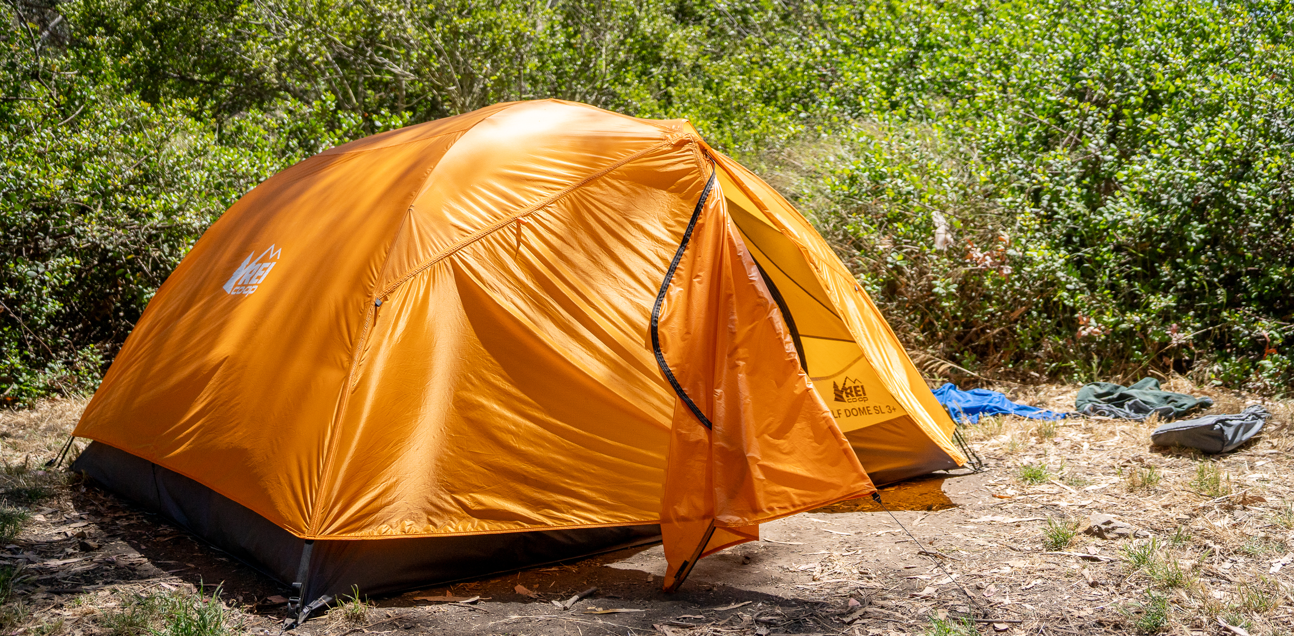 a bright orange backpacking tent