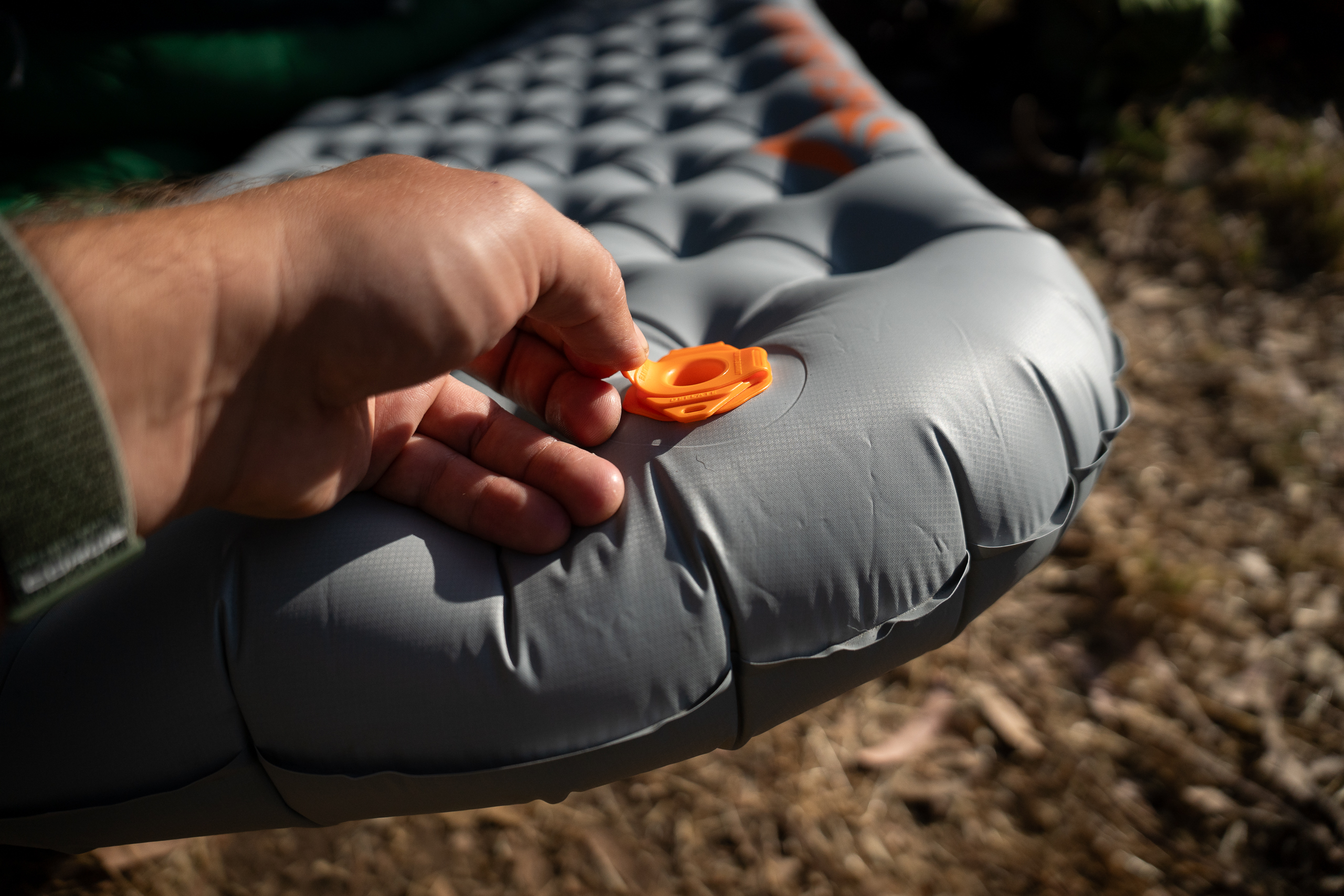 the valve on a backpacking sleeping pad