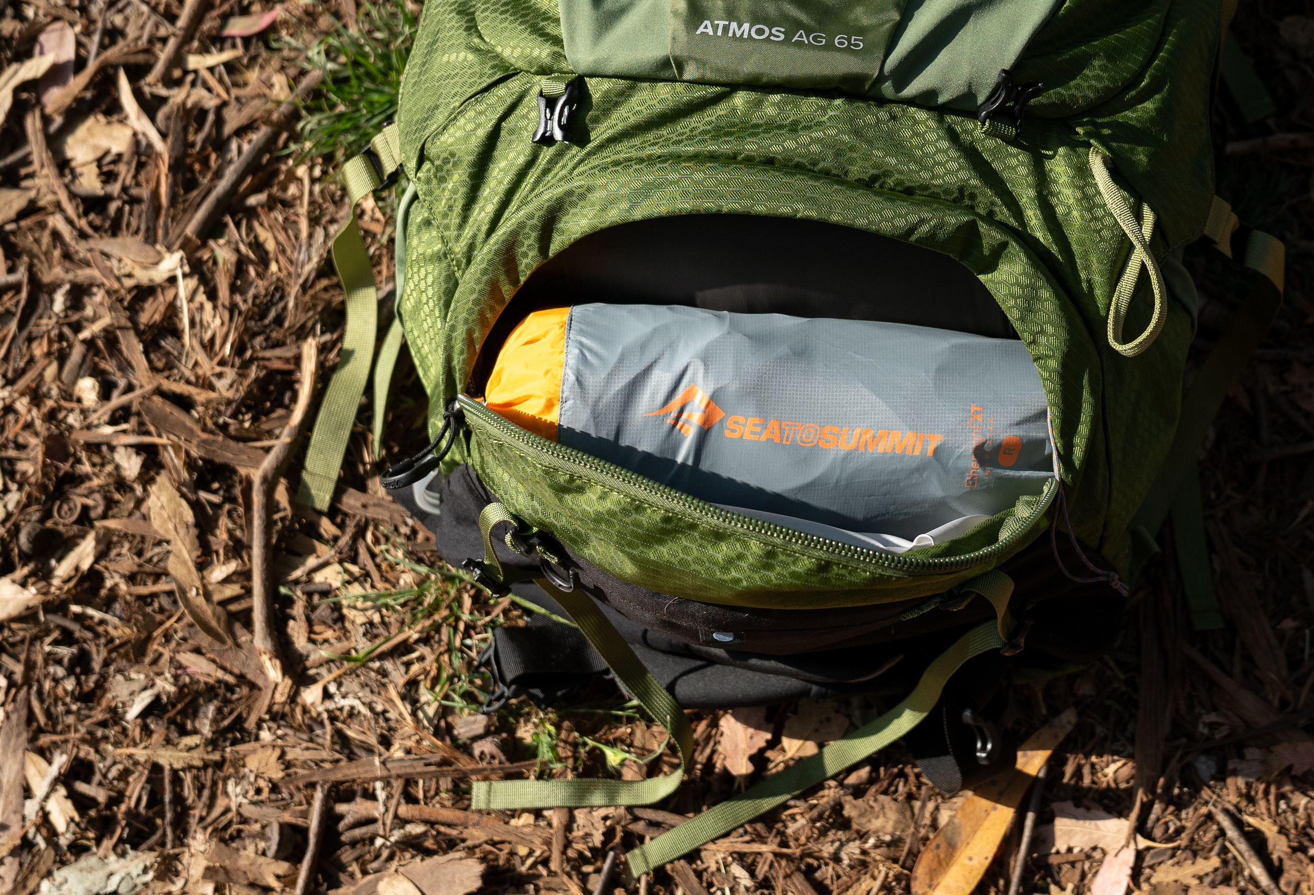 a backpacking sleeping pad in a pack