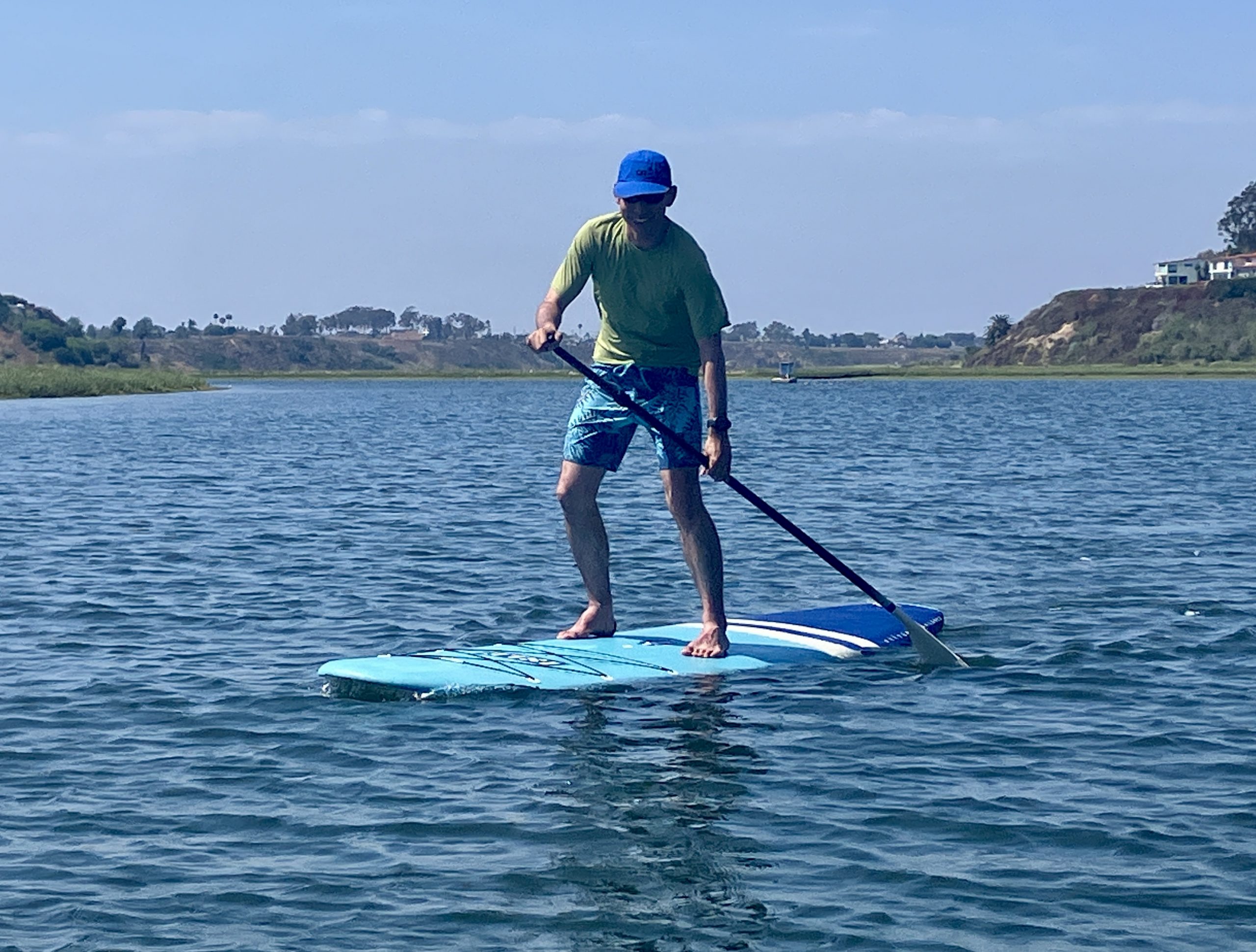 a man on a paddle board