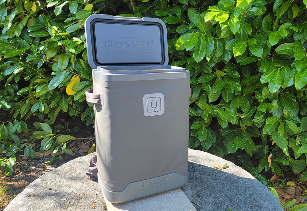 the brumate backpack cooler with the lid open