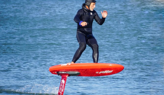 Bowen riding the Axis Foil Drive board with Foil Drive