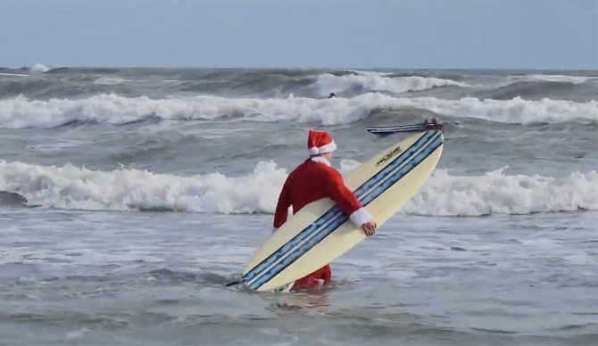 Photo: Surfing Santas // YouTube